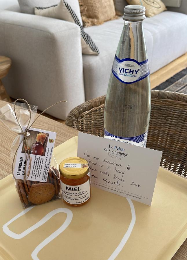 Appartement Le Palais Du Commerce Vichy Bagian luar foto